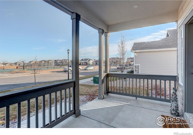 balcony featuring covered porch