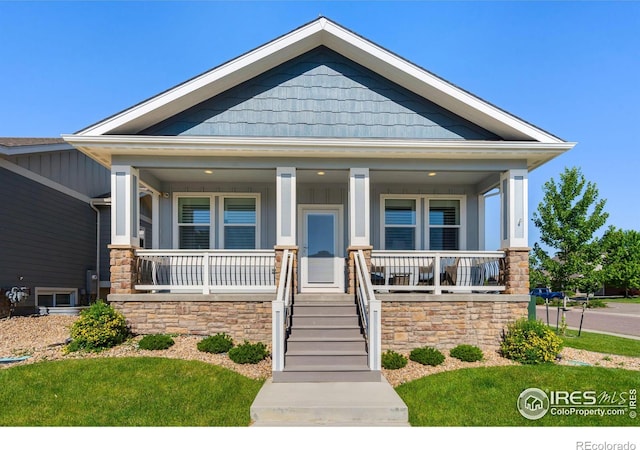 craftsman inspired home featuring a porch