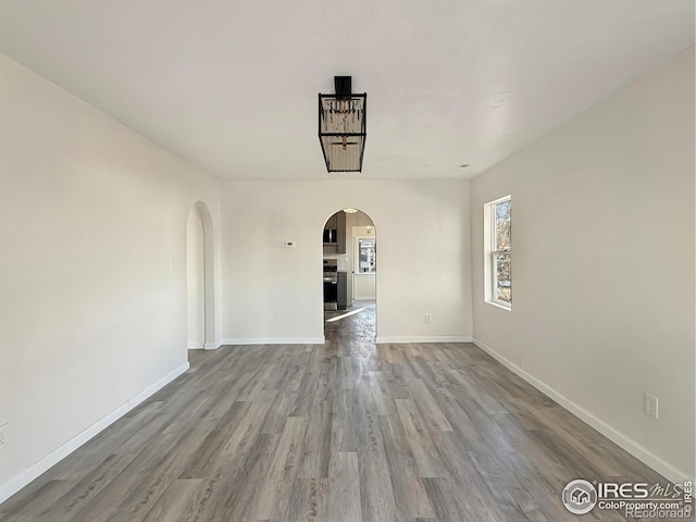 spare room featuring light hardwood / wood-style floors