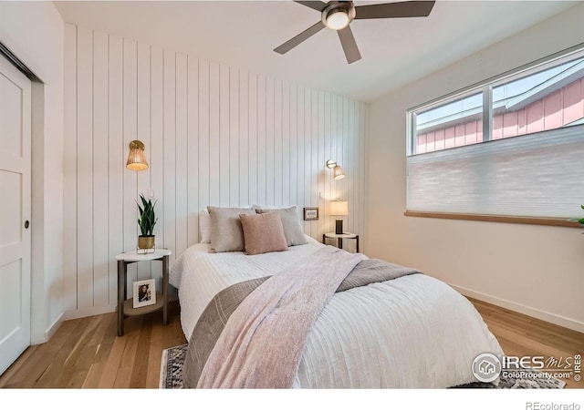 1998 Foxtail Ln Unit B, Lafayette, CO 80026 - bedroom featuring light wood finished floors, baseboards, and ceiling fan