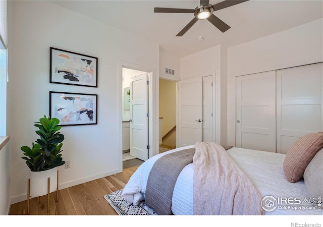 1998 Foxtail Ln Unit B, Lafayette, CO 80026 - bedroom with wood finished floors, baseboards, a closet, ensuite bath, and ceiling fan