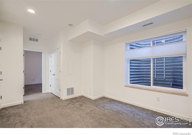 1998 Foxtail Ln Unit B, Lafayette, CO 80026 - spare room featuring baseboards, carpet flooring, and recessed lighting