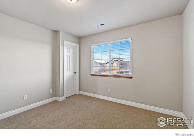 empty room featuring carpet