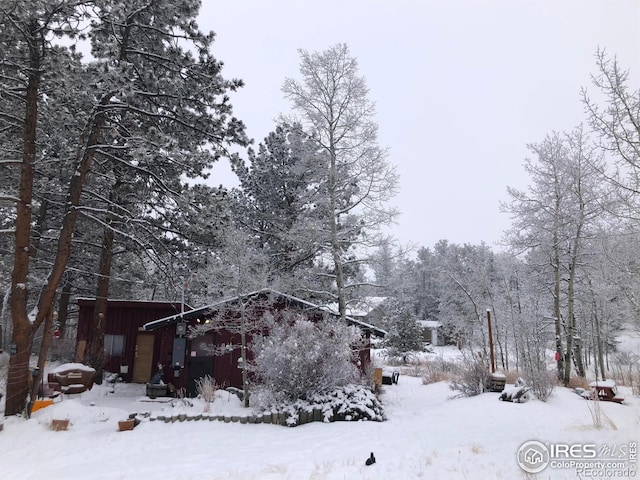 view of snow covered property