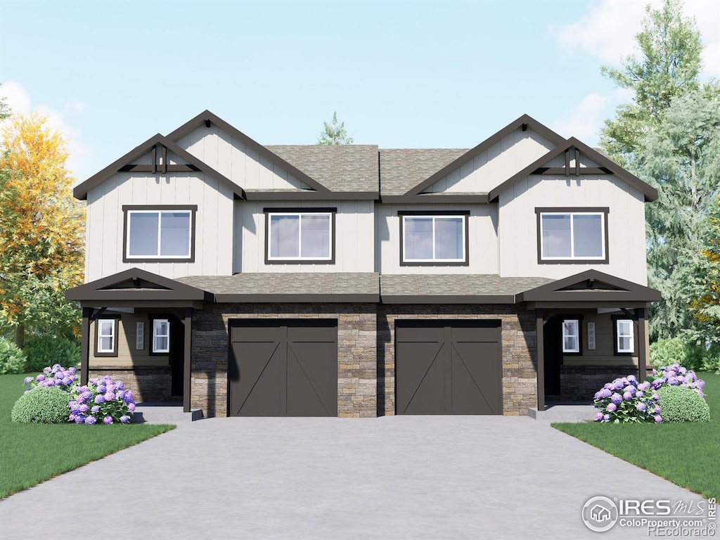 view of front of property with a garage