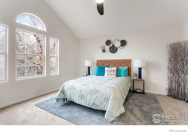 bedroom featuring visible vents, baseboards, lofted ceiling, ceiling fan, and carpet floors