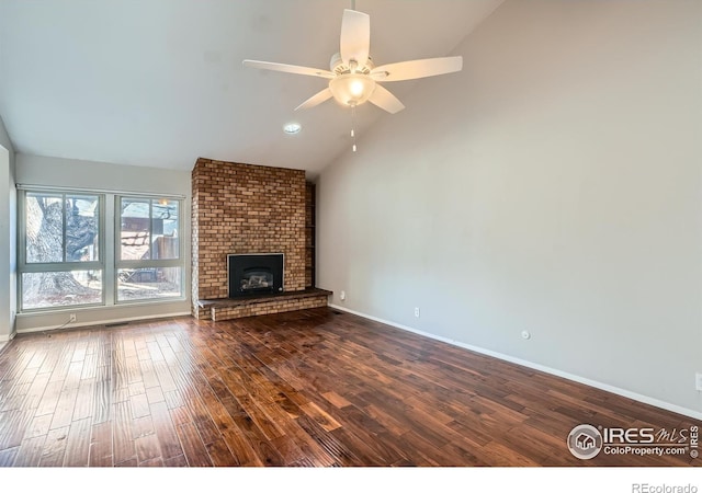 unfurnished living room with ceiling fan, a fireplace, dark wood-type flooring, and lofted ceiling