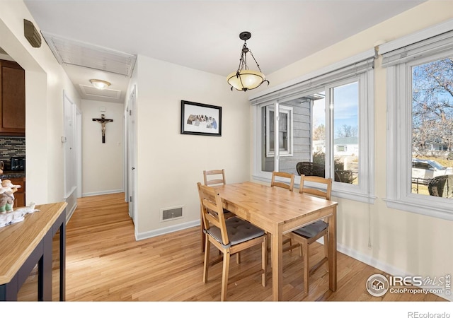 dining room featuring light hardwood / wood-style flooring