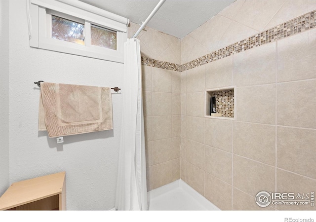 bathroom featuring walk in shower