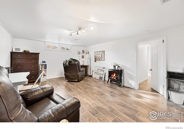 living room with a textured ceiling