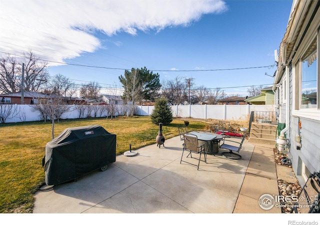 view of patio featuring a grill