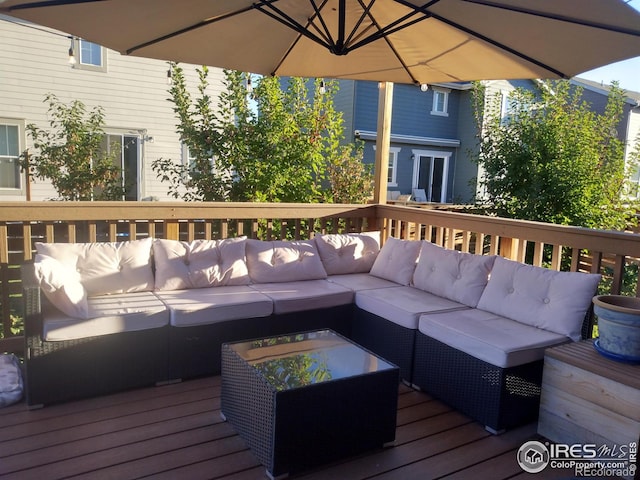 wooden deck featuring outdoor lounge area