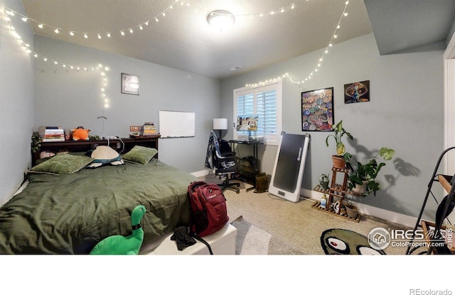 bedroom featuring carpet flooring