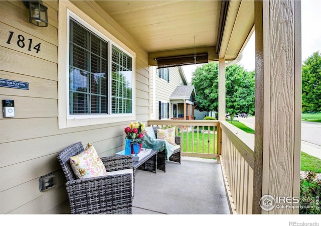 balcony featuring a porch