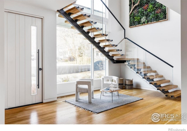 entryway with light hardwood / wood-style flooring