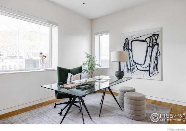 home office featuring light wood-type flooring