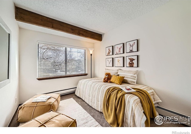 bedroom featuring carpet floors, a textured ceiling, and a baseboard radiator