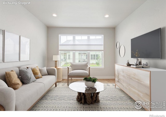 living room with light hardwood / wood-style floors