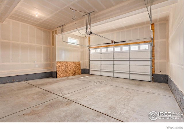 garage featuring a garage door opener