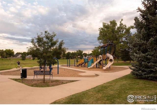 community playground featuring a lawn