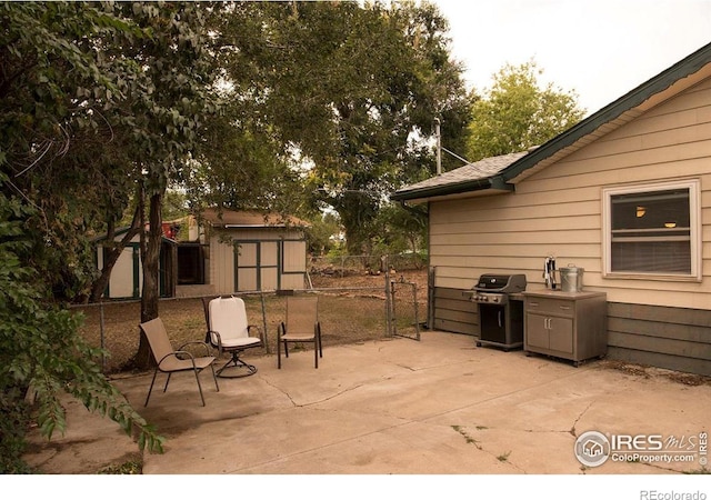 6213 Gray St, Arvada, CO 80003 - view of patio / terrace featuring a grill