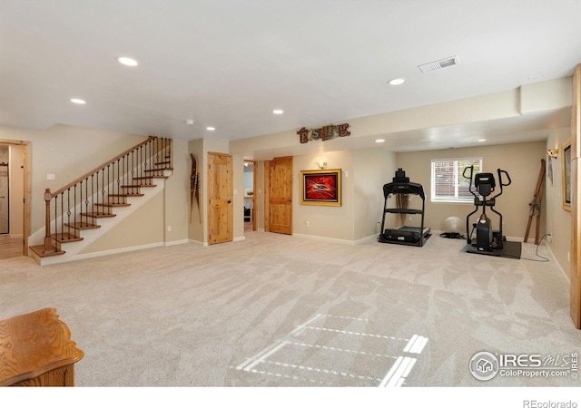 workout room with light carpet