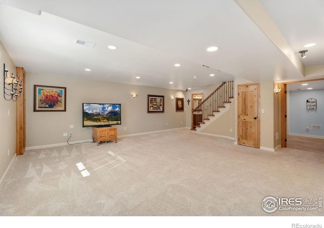 basement featuring light colored carpet