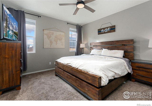 bedroom featuring light carpet and ceiling fan