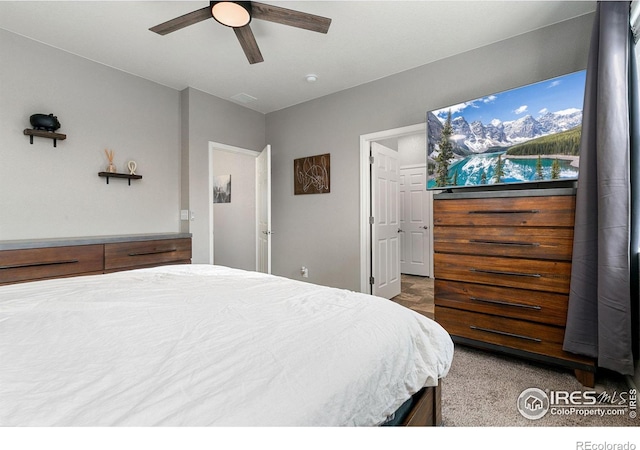 bedroom featuring carpet floors and ceiling fan