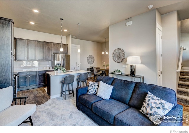 living room with light hardwood / wood-style flooring