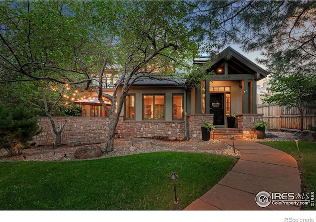 view of front of home with a front yard