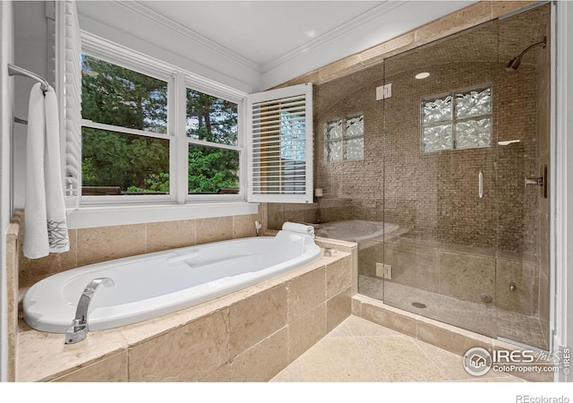 bathroom with tile patterned flooring, crown molding, and independent shower and bath