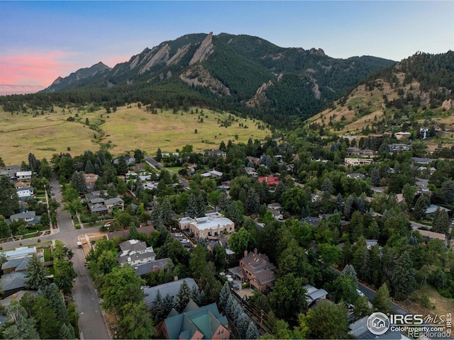 aerial view at dusk with a mountain view