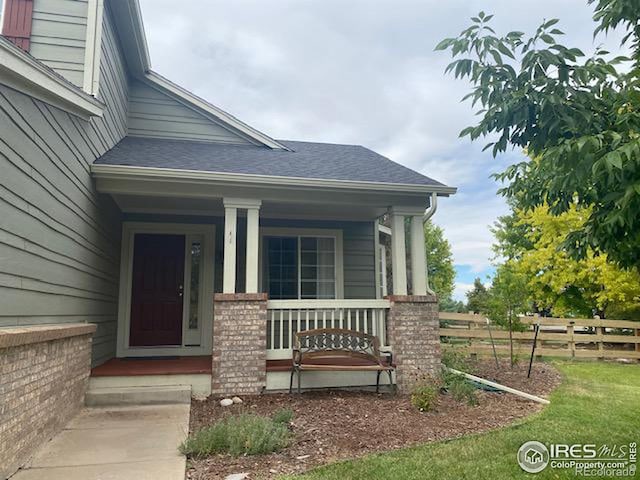 entrance to property with covered porch