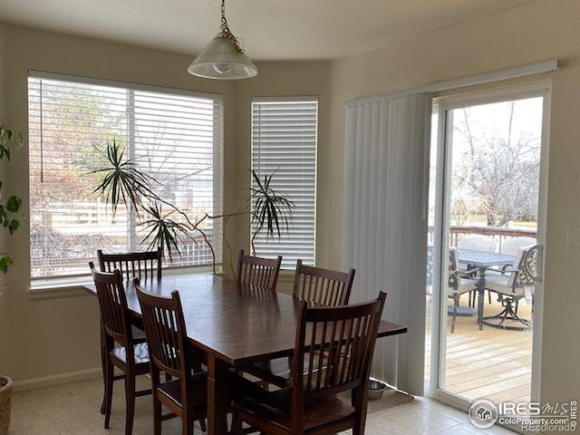 view of tiled dining space