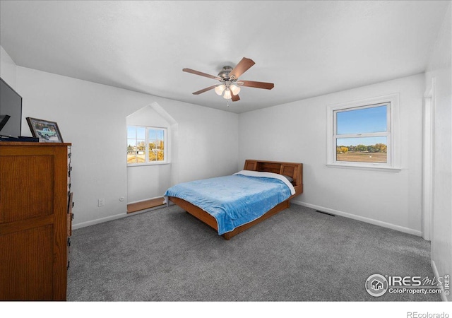 carpeted bedroom with ceiling fan