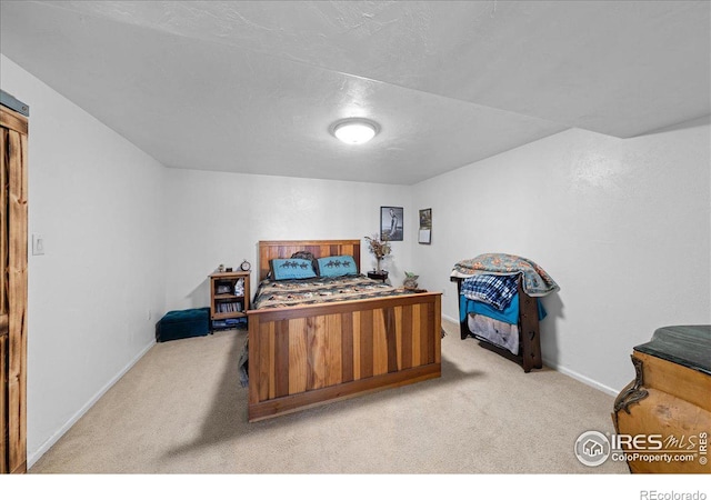 carpeted bedroom with a textured ceiling