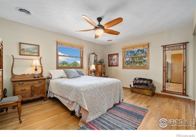 bedroom featuring ceiling fan and light wood-type flooring