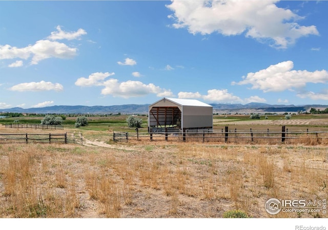 property view of mountains featuring a rural view