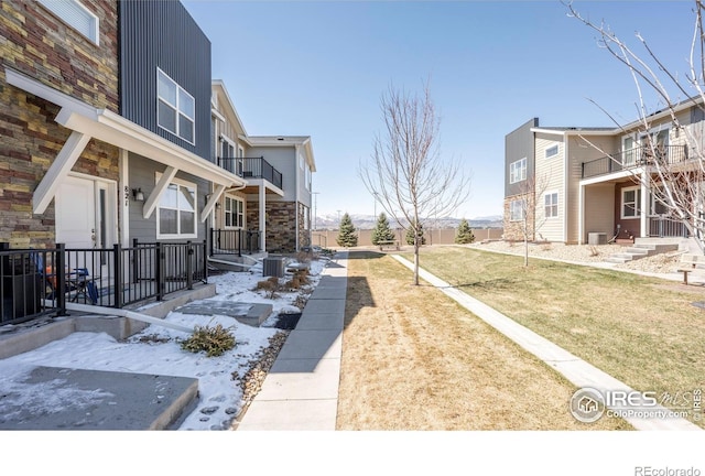 view of yard featuring a balcony