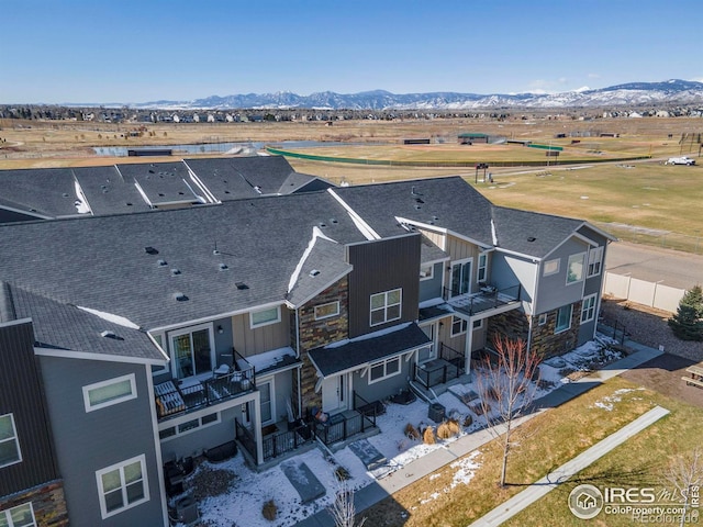 aerial view featuring a residential view and a mountain view