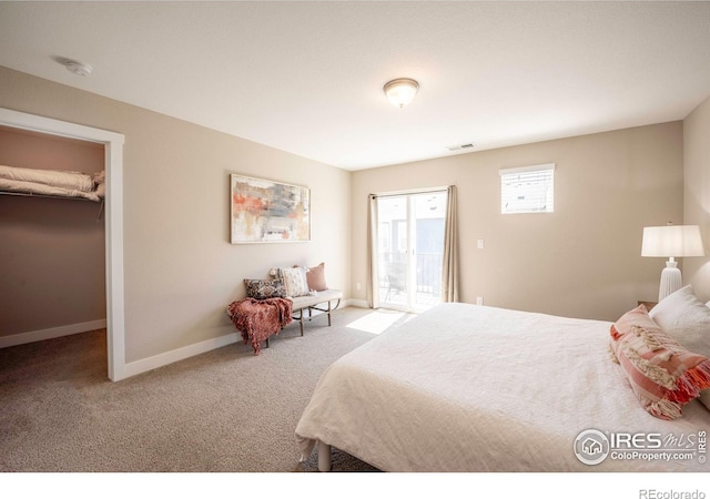 bedroom featuring light carpet, baseboards, and visible vents