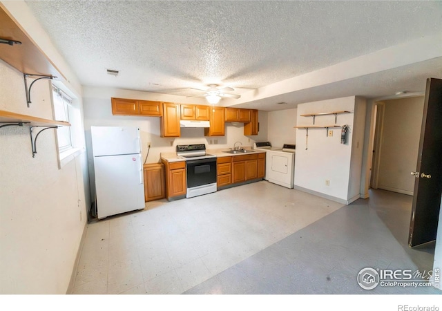 kitchen with white appliances, sink, ceiling fan, a textured ceiling, and washer / dryer