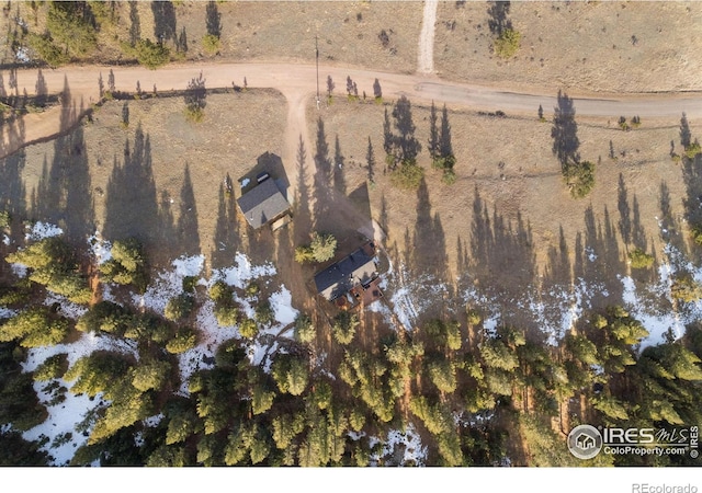 birds eye view of property featuring a rural view