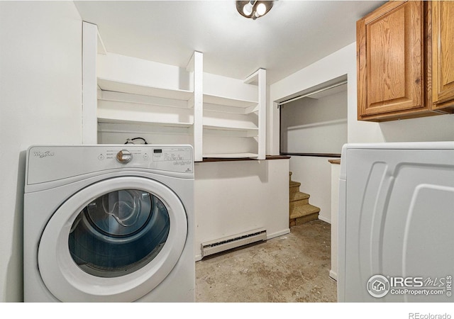 washroom featuring cabinets, washer / clothes dryer, and a baseboard radiator