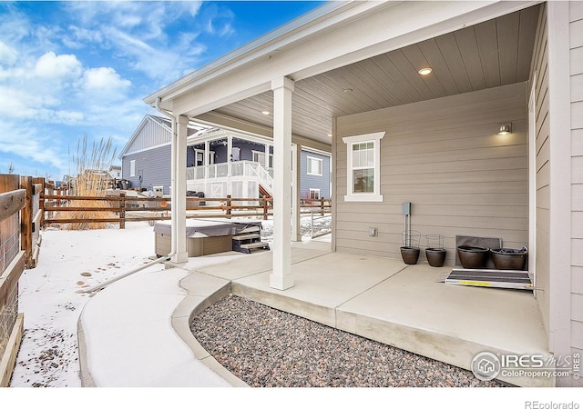 view of snow covered patio