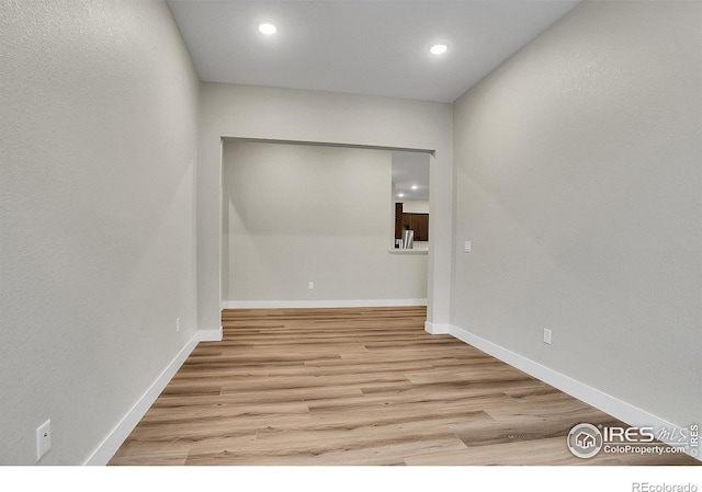 unfurnished room featuring light hardwood / wood-style floors