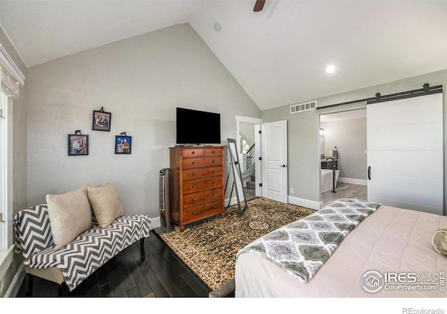 bedroom featuring a barn door, ceiling fan, high vaulted ceiling, and hardwood / wood-style flooring