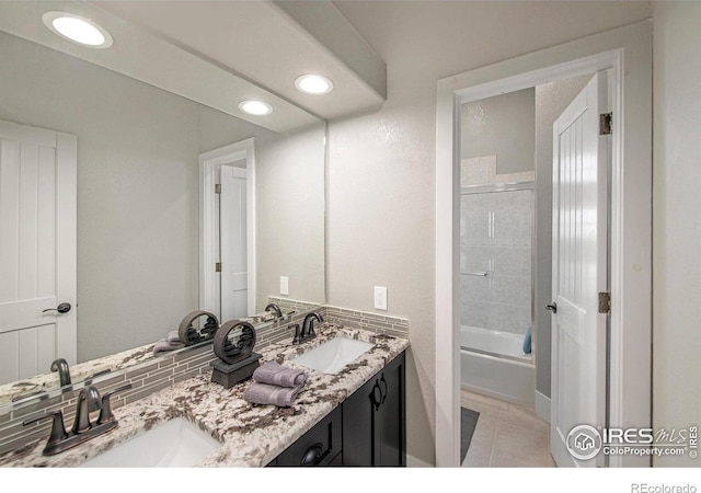 37001 Soaring Eagle Cir, Severance, CO 80550 - bathroom with double vanity, tile patterned floors, recessed lighting, and bathing tub / shower combination