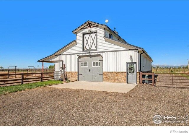 37001 Soaring Eagle Cir, Severance, CO 80550 - view of barn featuring driveway and a rural view